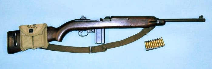 M1 카빈과 30구경 카빈탄. 전반적으로 권총탄을 연장한 형태다. < 출처 : (cc) Curiosandrelics at Wikimedia.org >